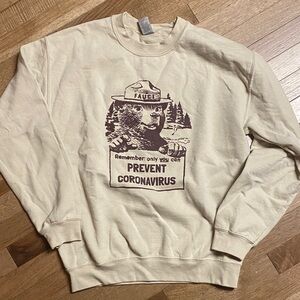 Cream Graphic Men Sweatshirt Prevent coronavirus smoky the bear